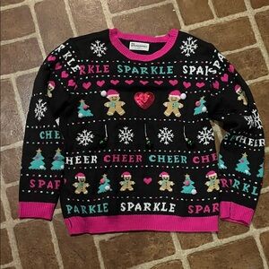 No Boundaries Ugly Christmas Sweater with hanging ornaments and sequins.